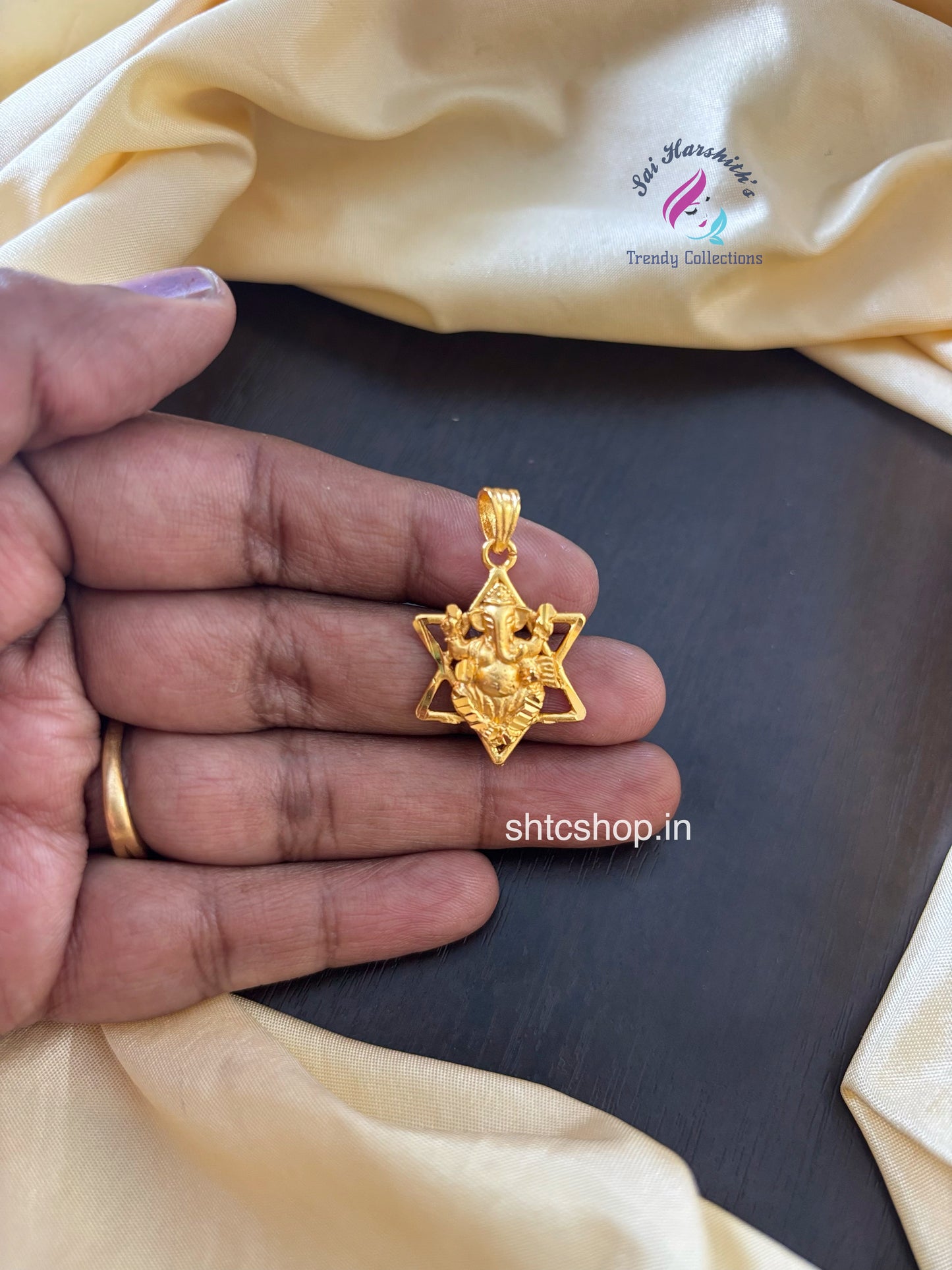 1 gm gold polished cute Ganesha pendant with a Star - SHTC1590