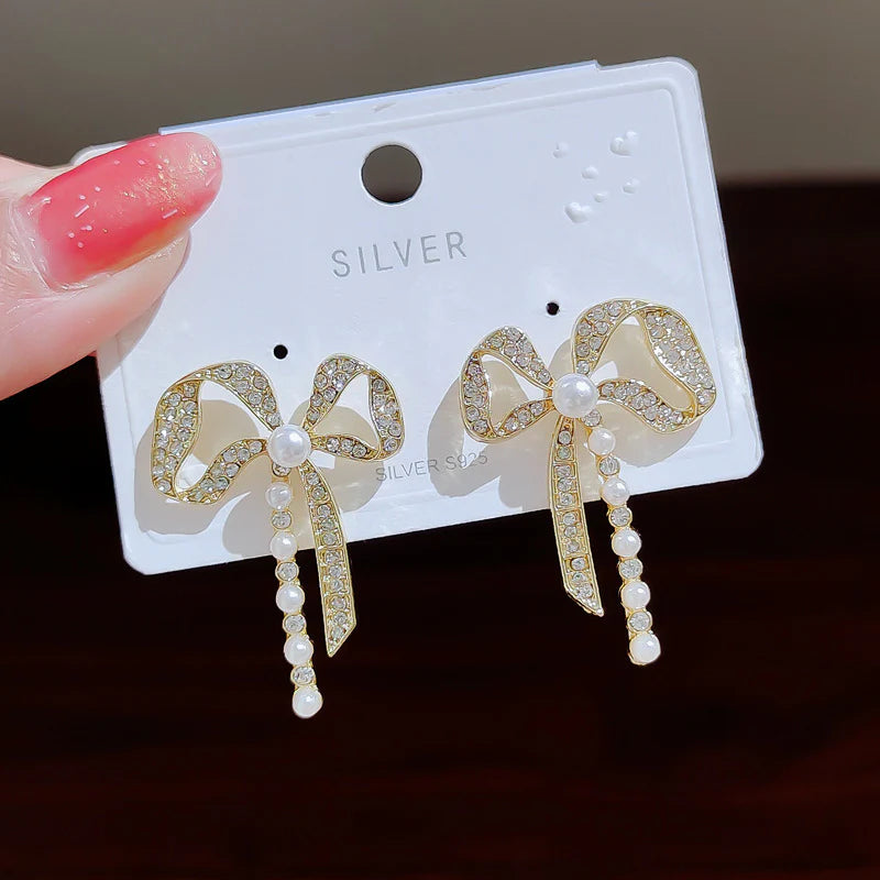 Diamond bow pearl Korean earrings - KE576