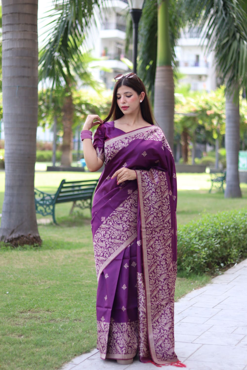 Magenta color soft handloom raw silk saree with weaving work