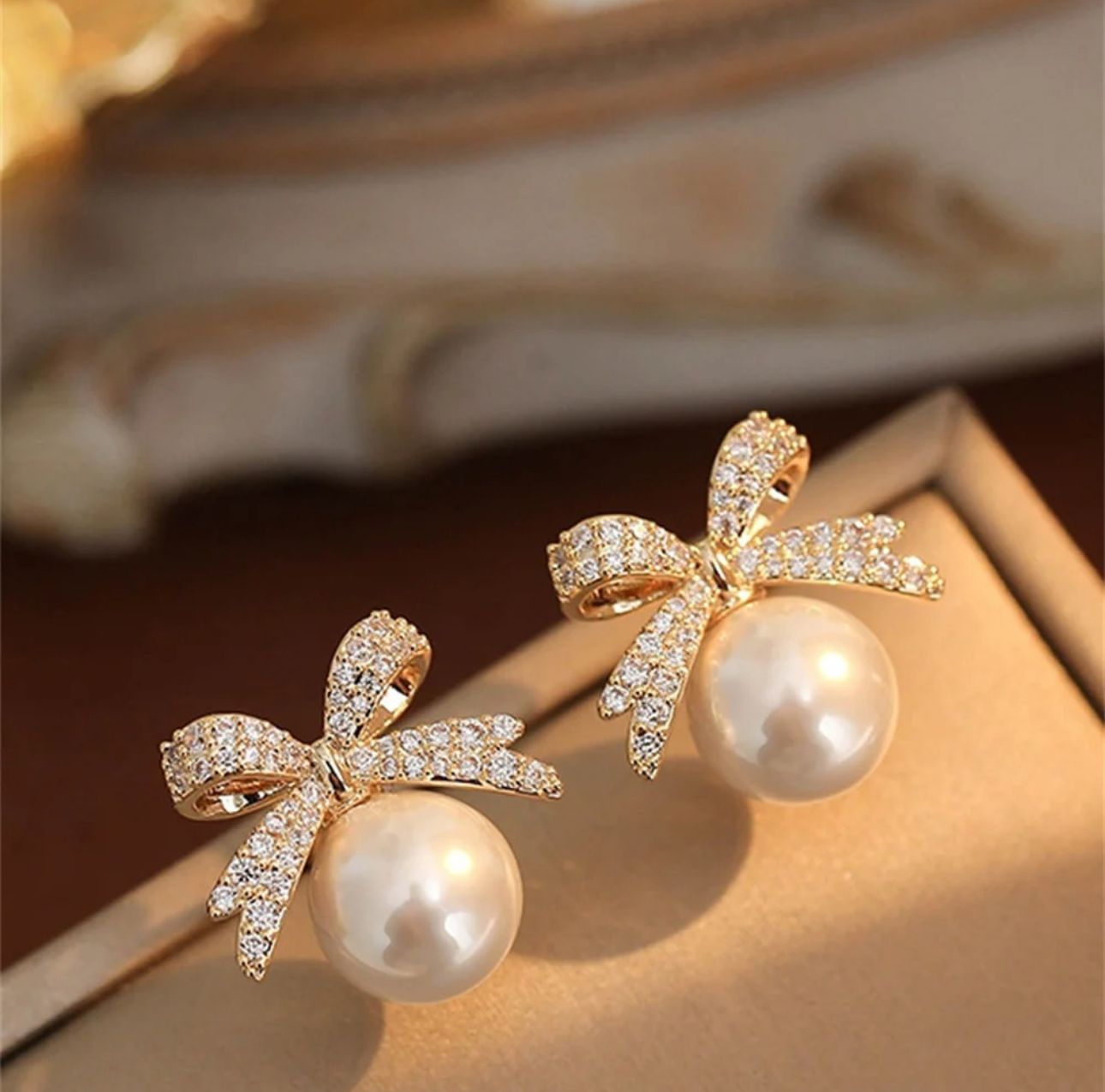 White Pearl Bow Studs - KE101