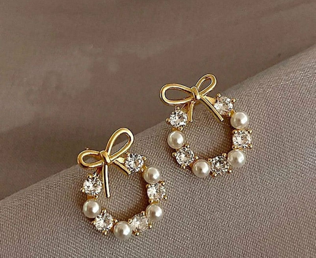 Bow knot pearl ear studs - KE151