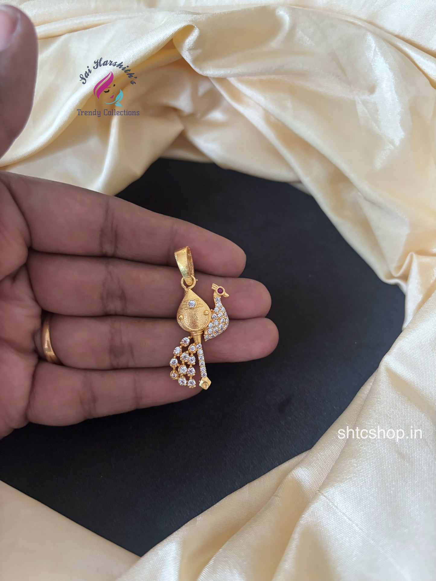1 gm Gold Polished Pendant with Vel and Peacock (White Stones) - SHTC1717