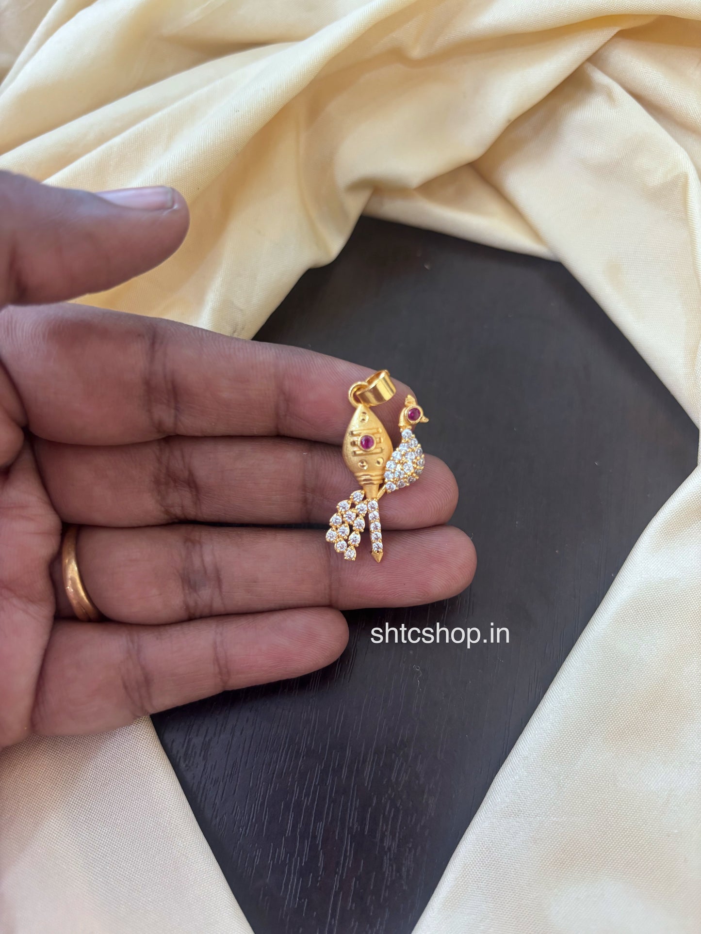 1 gm Gold Polished Pendant with Vel and Peacock (White Stones) - SHTC1824