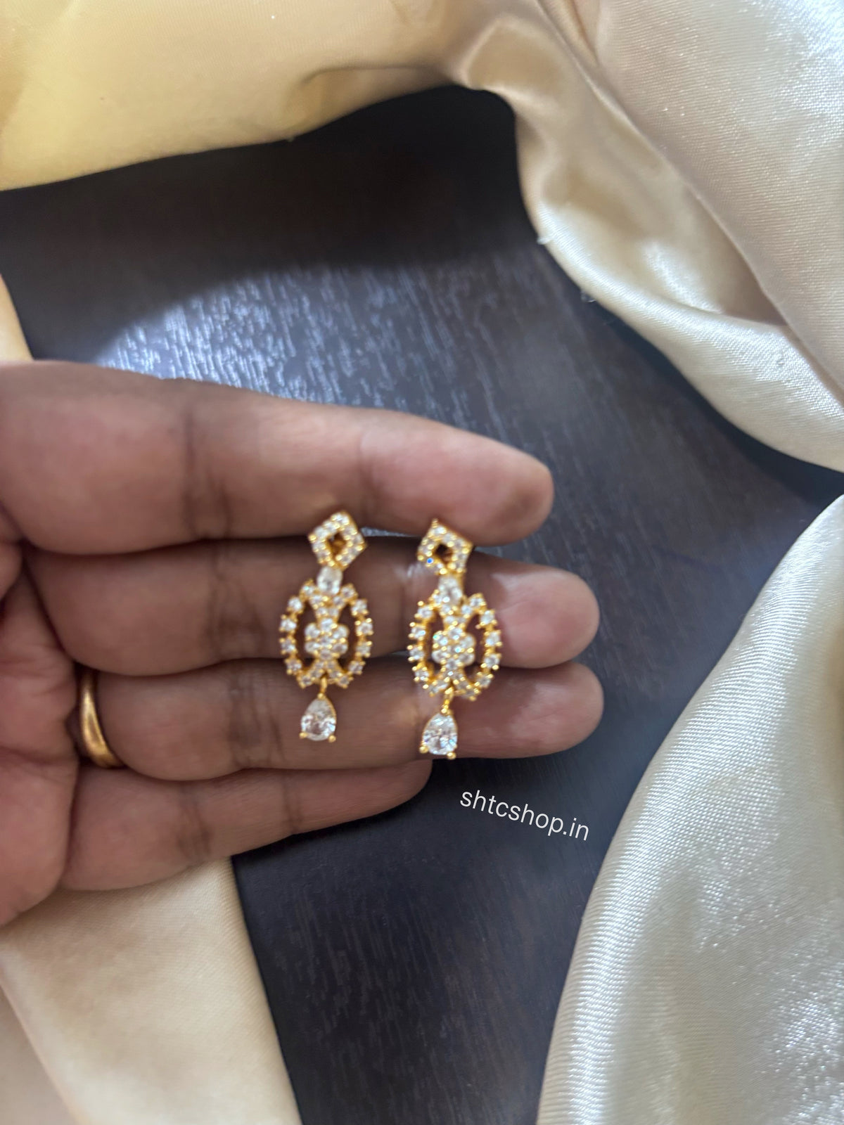 Gold Polished AD Stone Earrings with Back Screw - SHTC1963