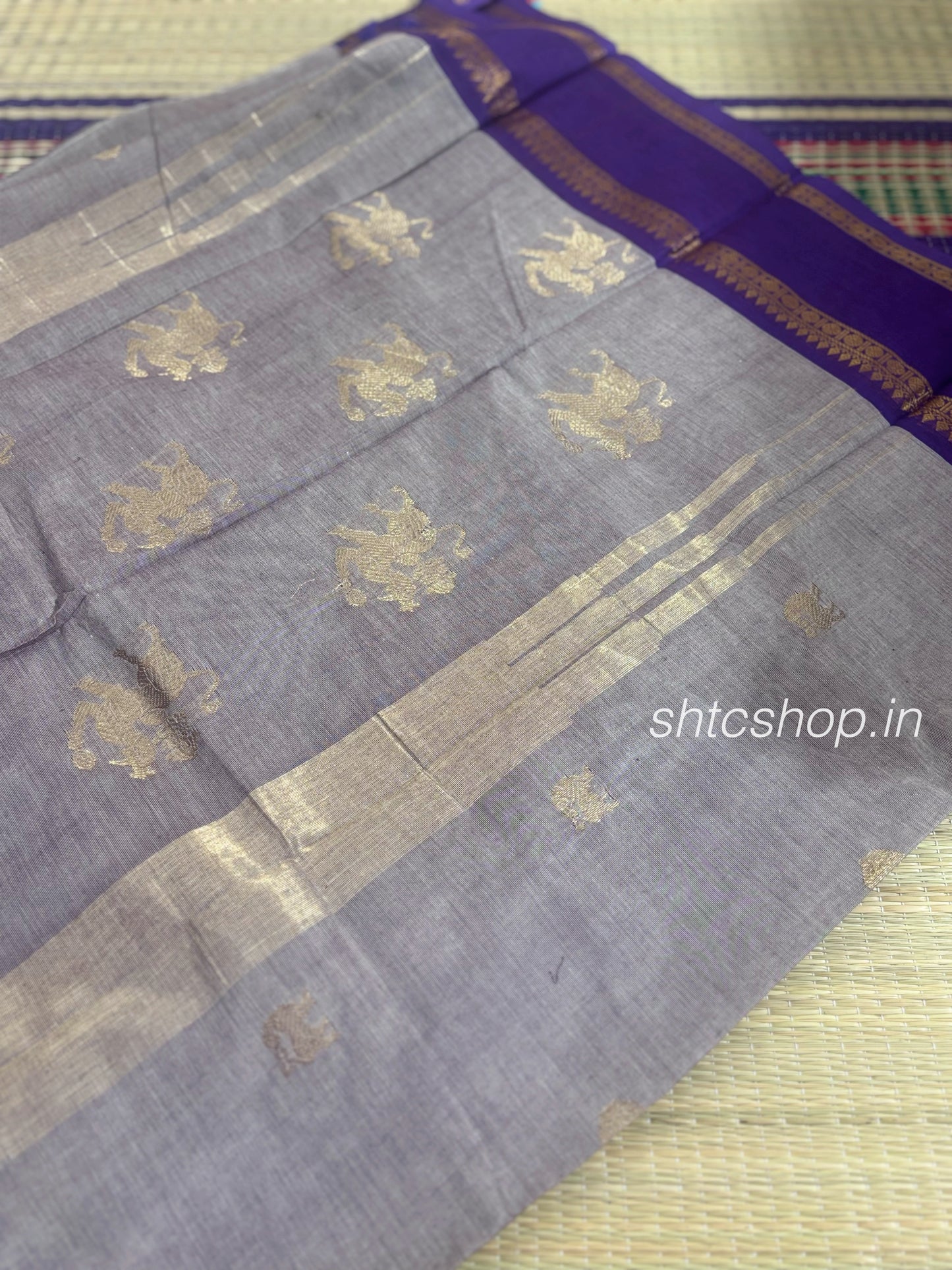 120 Count Grey Kanchi Cotton Saree with Horse Buttas and Purple Zari Border