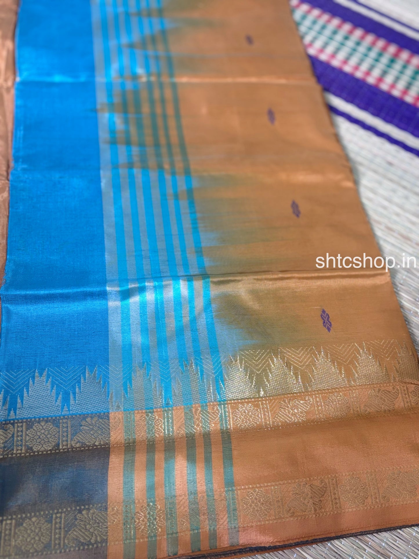 Turquoise Blue Banana Silk Saree with Copper Brown Contrast Pallu, Woven Buttas and Contrast Blouse  Description