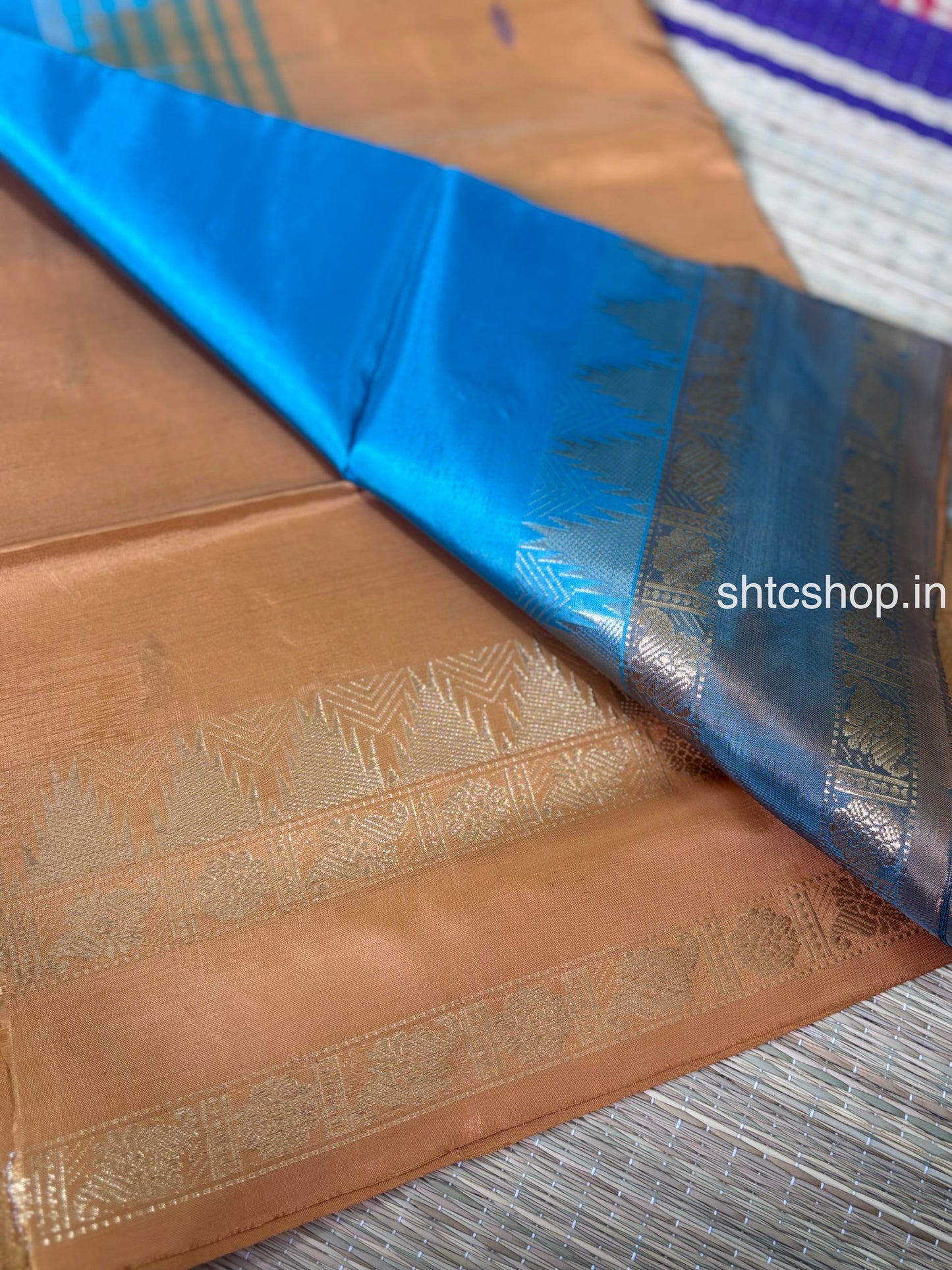 Turquoise Blue Banana Silk Saree with Copper Brown Contrast Pallu, Woven Buttas and Contrast Blouse  Description