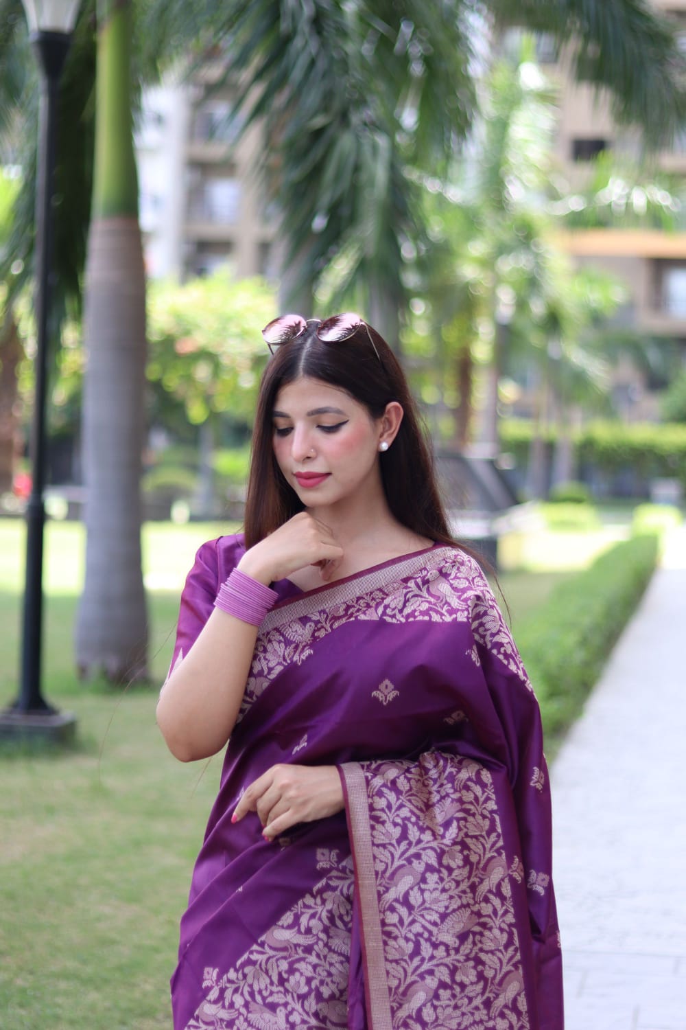 Magenta color soft handloom raw silk saree with weaving work