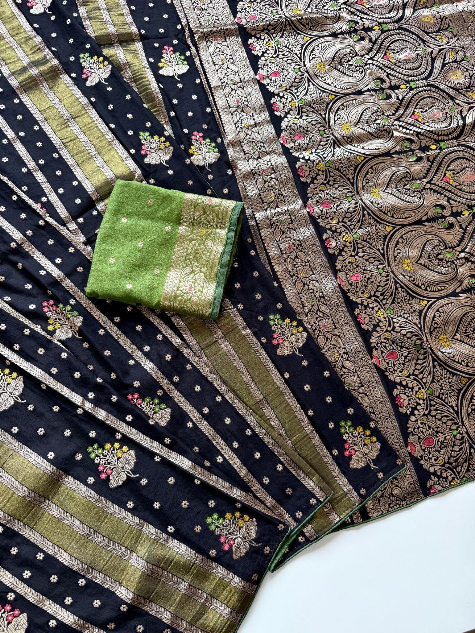 Black Viscose Georgette Silk Saree with Multicolour Zari Weaving and Green Blouse