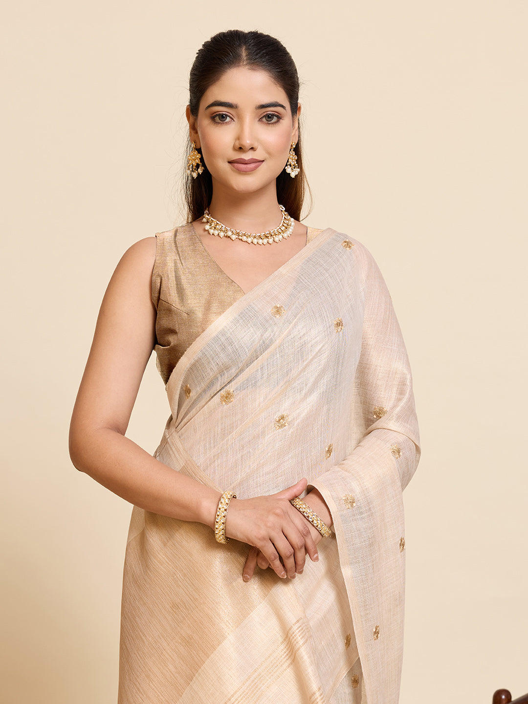 Beige Linen Cotton Saree with Embroidery Work and Contrast Golden Blouse - Golden